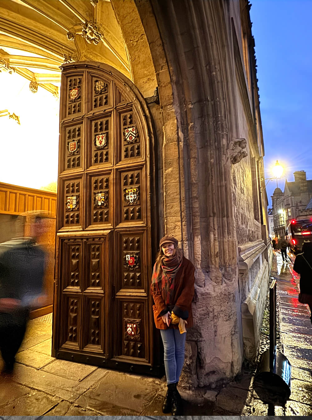 you can see a girl standing in front of the Bodleian Library.