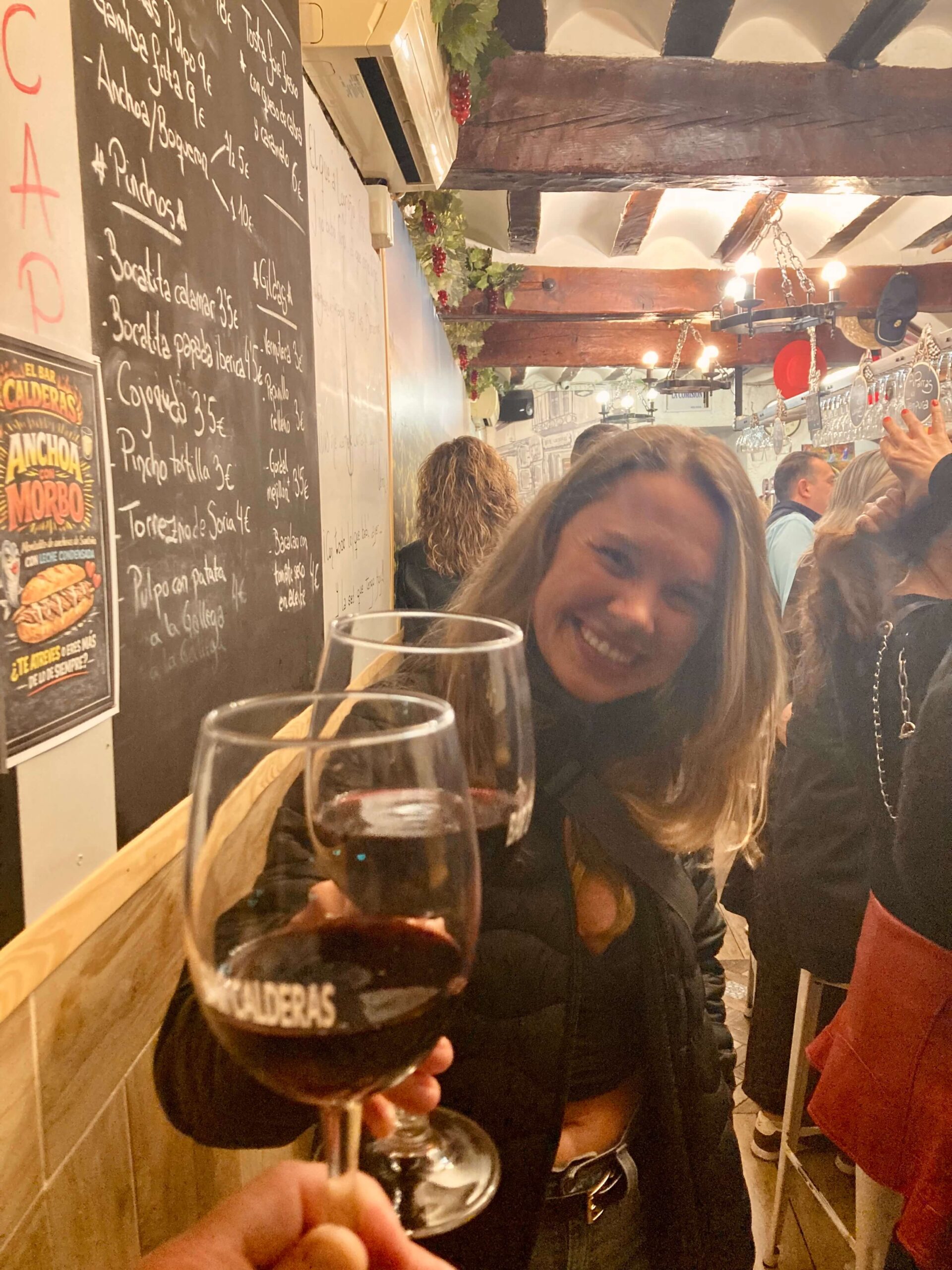 A girl enjoying her red wine at the Logrono wine fest.